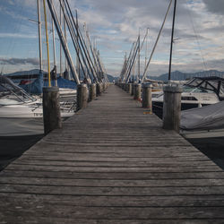 Pier over sea against sky