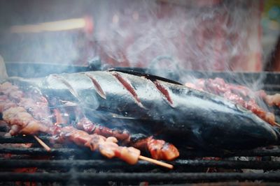 Close-up of meat on barbecue grill