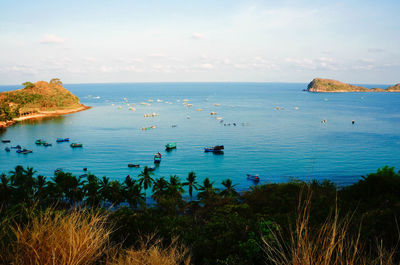 Fishing boats on sea at nam du island against sky