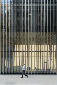 Full length of a man walking in building