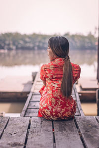 Young woman in traditional clothing outdoors