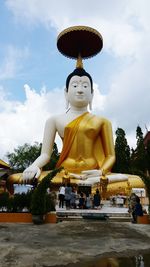 Low angle view of statue against sky