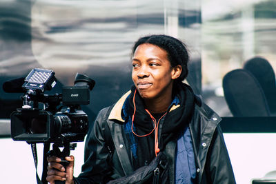 Portrait of man photographing