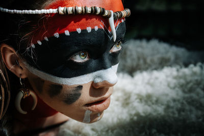 Close-up portrait of man wearing mask