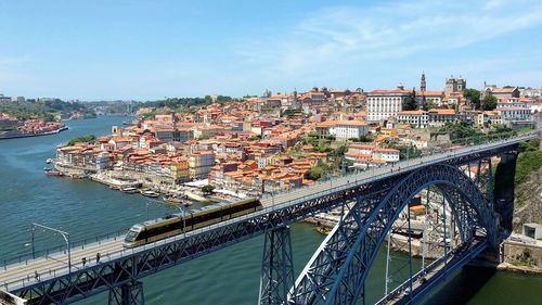 Tram crossing bridge in porto