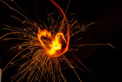 Firework display at night