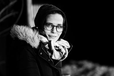 Portrait of woman wearing eyeglasses during winter