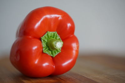 Close-up of red bell peppers on table