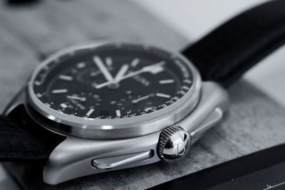 High angle view of clock on table