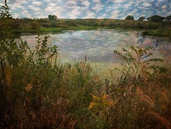 Scenic view of lake against sky