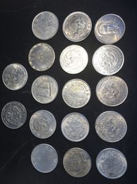 High angle view of coins on table