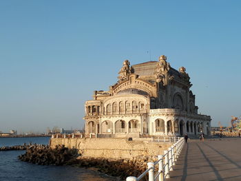 Historic building against clear blue sky