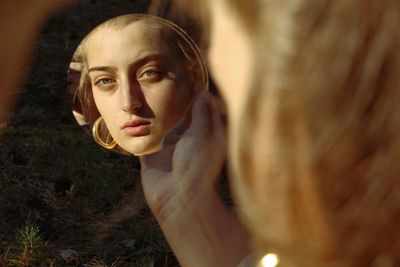 Portrait of young woman looking away