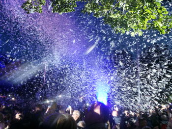 People enjoying music concert