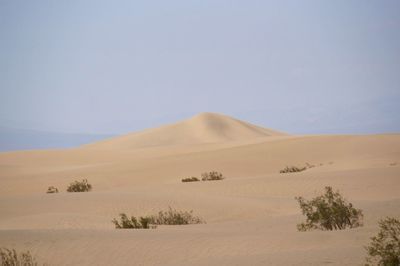 Scenic view of desert against clear sky, death valley