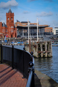 Boats moored at harbor