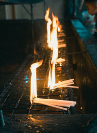 Close-up of fire burning in wood