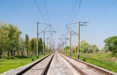 View of railroad tracks against clear sky