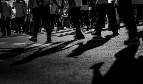 People walking on street in city