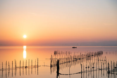 Scenic view of sea against sky during sunset