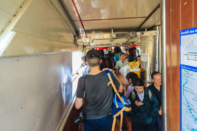 People standing in bus