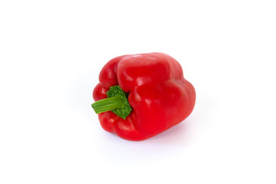 Close-up of red bell pepper against white background