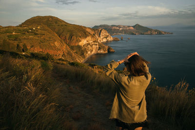 Rear view of woman on looking at landscape
