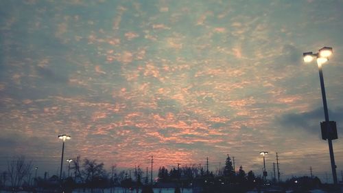 Low angle view of dramatic sky during sunset