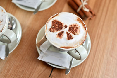 High angle view of coffee cup on table