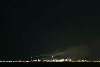 Illuminated cityscape at night