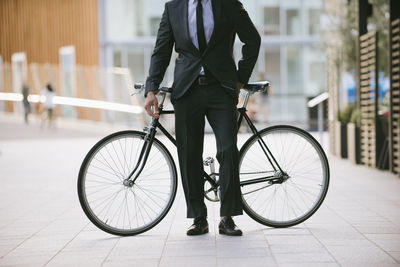 Man riding bicycle on street