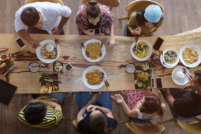 High angle view of people eating food