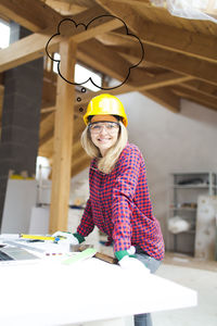 Portrait of smiling woman working