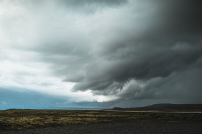 Storm clouds over landscape