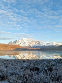 View of the torres del paine from the route to the park, the lagoon is froozen.