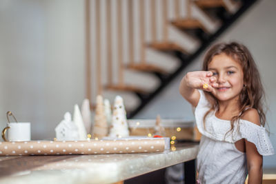 Portrait of smiling girl at home