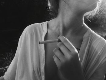 Midsection of woman holding hands