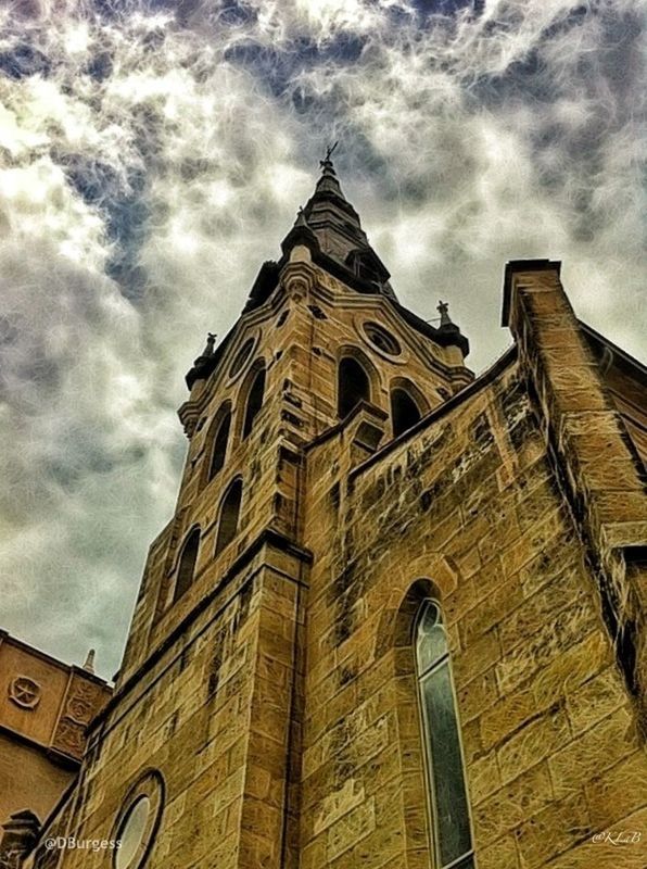 architecture, low angle view, building exterior, built structure, sky, church, religion, cloud - sky, place of worship, cloud, spirituality, history, tower, cloudy, cathedral, clock tower, outdoors, day