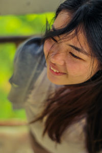 Close-up portrait of a young woman