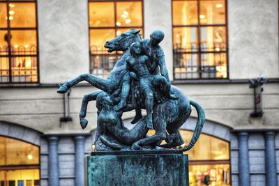 Close-up of statue against building