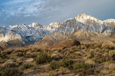 Scenic view of snowcapped mountains against sky