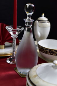 Close-up of glasses on table in restaurant