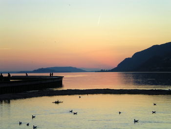 Scenic view of sea against sky during sunset