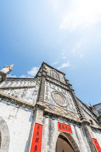 Low angle view of traditional building against sky