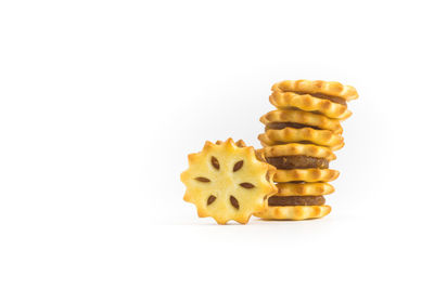 Close-up of cake against white background