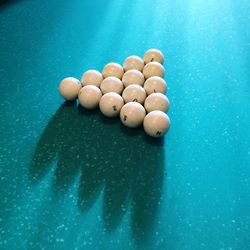 High angle view of pool balls on table