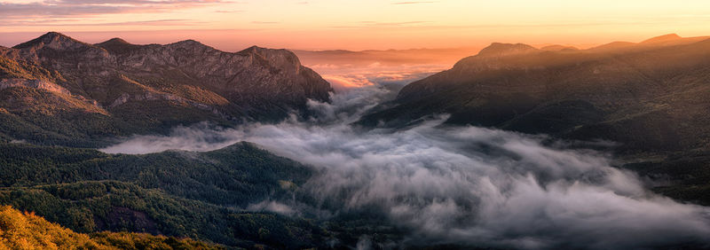 Panoramic view of mountains during sunset