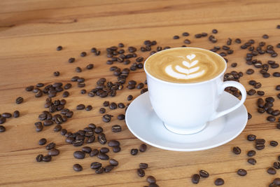 High angle view of coffee cup on table