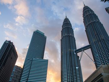 Low angle view of skyscrapers against sky