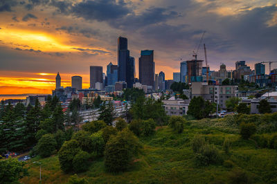 Cityscape against sky during sunset